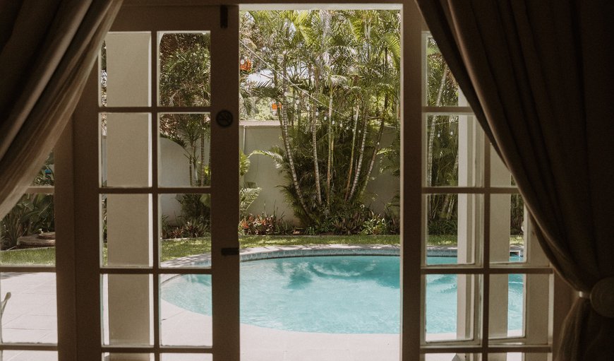 King Bedroom, pool view - Ocean Breeze: View from Room