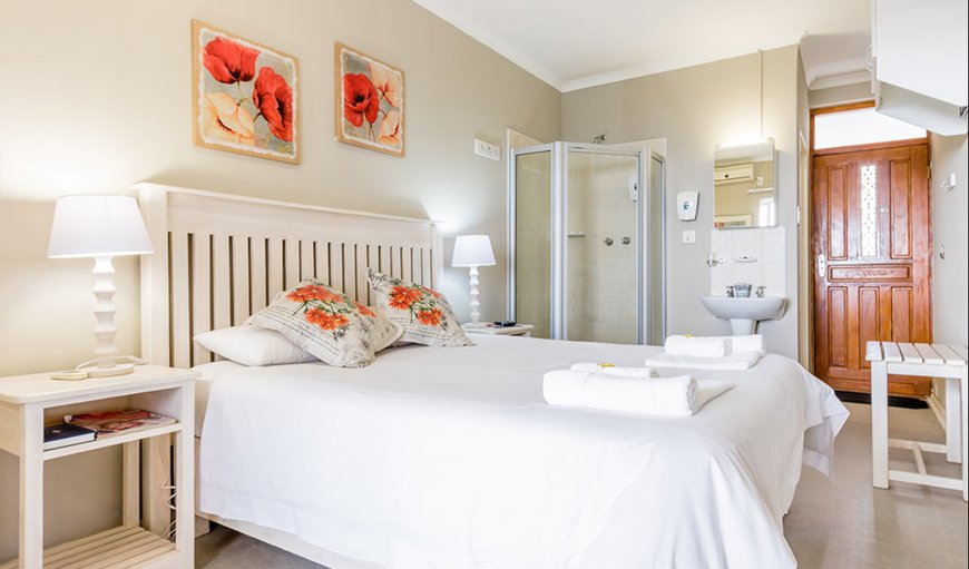 Open Plan Unit 4 - Queen bed: Unit 4 with a Queen-sized Bed with Electric Blankets, Dressing Table with Hairdryer, TV with DStv Guesthouse Bouquet, Free Wi-Fi and Air-conditioning.