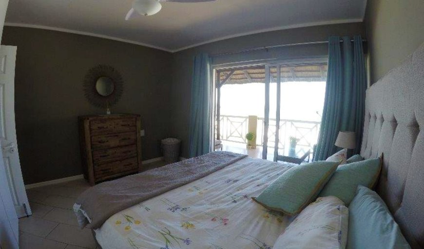 Waterfront 8 2B1B CB: The first bedroom contains a king-size bed that can be converted to 2 single beds