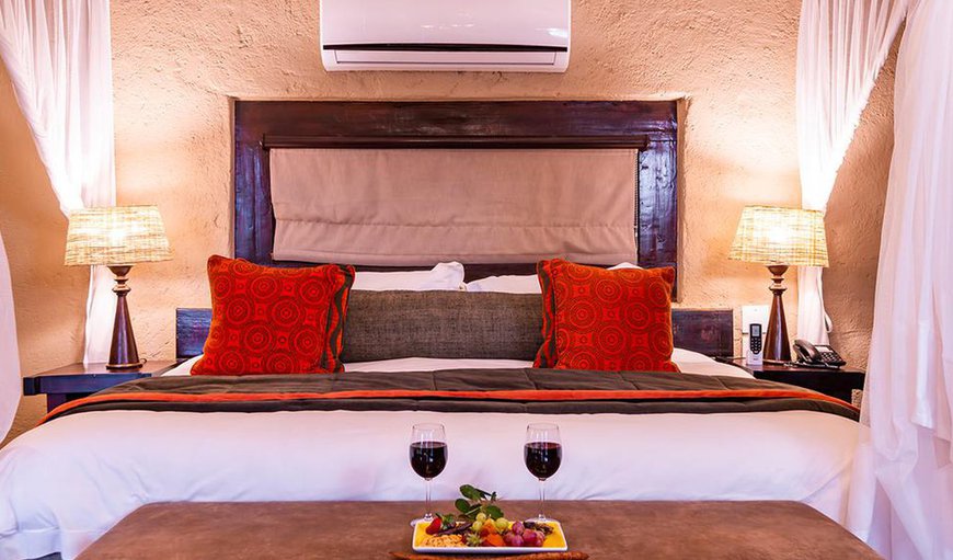 River Lodge Thatched Suites: River Lodge Thatched Suites - This bedroom is furnished with a king size bed