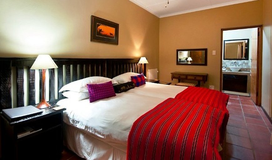 Upmarket Lodge Rooms: Room with double/2 single beds.