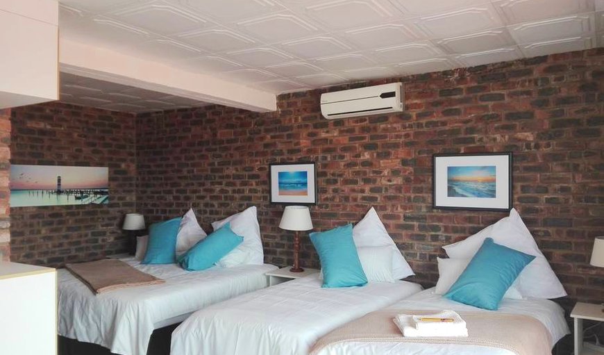 Ocean View Family Room: Ocean View family sleeper room has a king-size bed and 2 single beds. The room is also equipped with a Fridge, a TV with full DSTV channels, Hairdryer, Air-Con and Tea- and Coffee-making facilties.