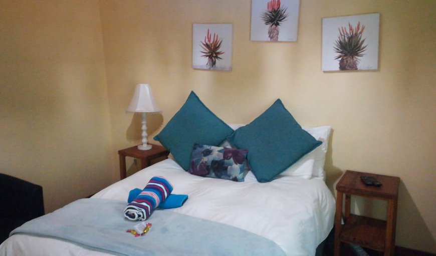 Main House - Bedroom with a double bed in Schoemansville, Hartbeespoort, North West Province, South Africa