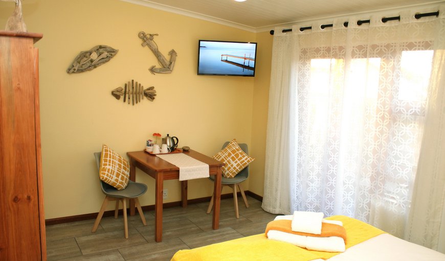 Double Room - Seashells: Seashells with en-suite bathrooms, DSTV, hairdryer, tea and coffee making facilities, soap and shower gel, heating, fans and their own entrance laid to the tranquil courtyard, equipped with sundeck chairs and umbrellas.